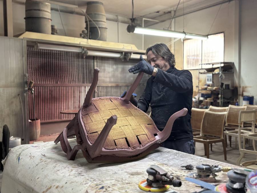 Craftsman working on chair